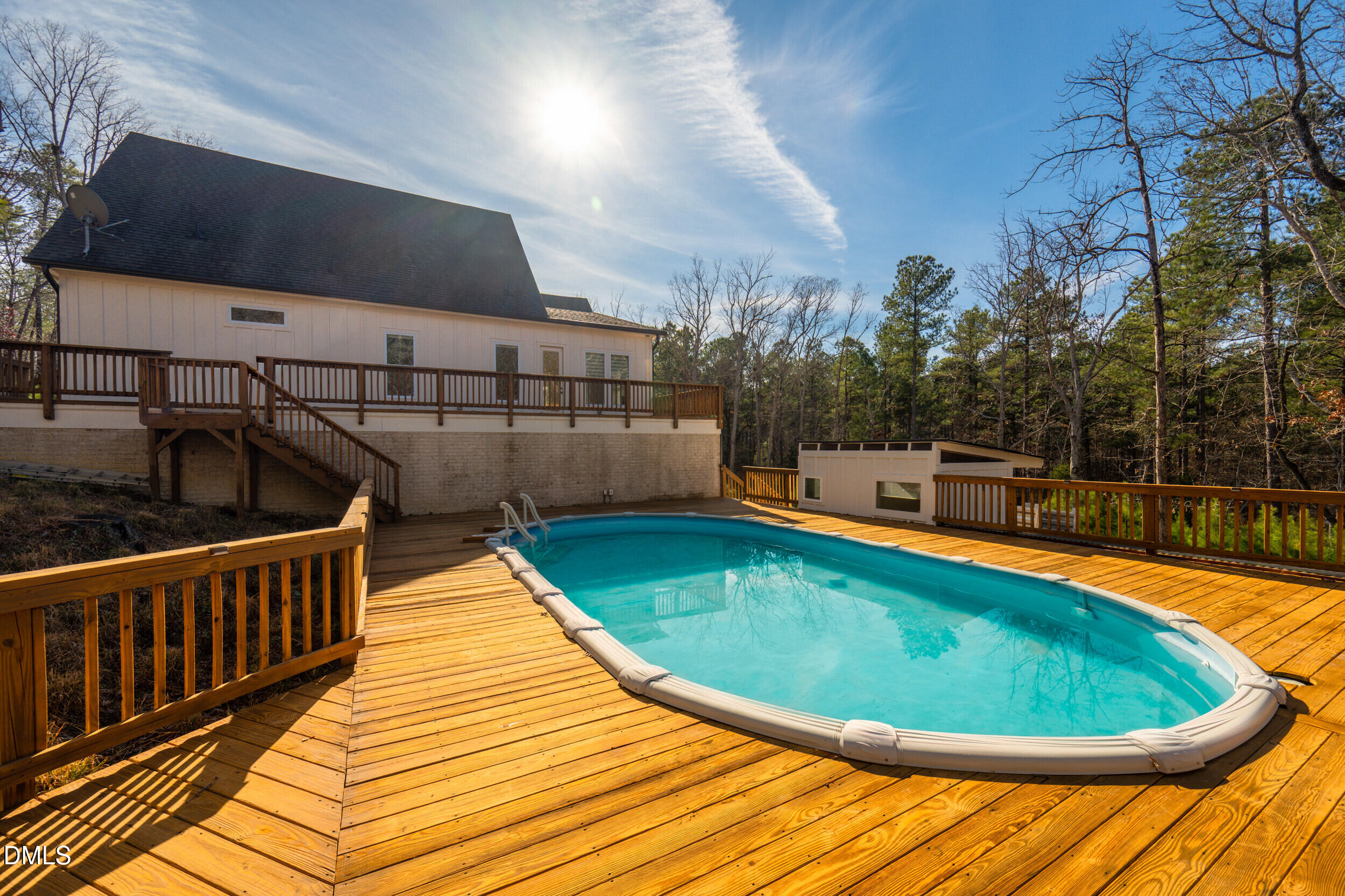 343 Deer Mountain Road Pittsboro, NC 27312 - Photo 48 of 55 a view of a swimming pool with a lounge chairs