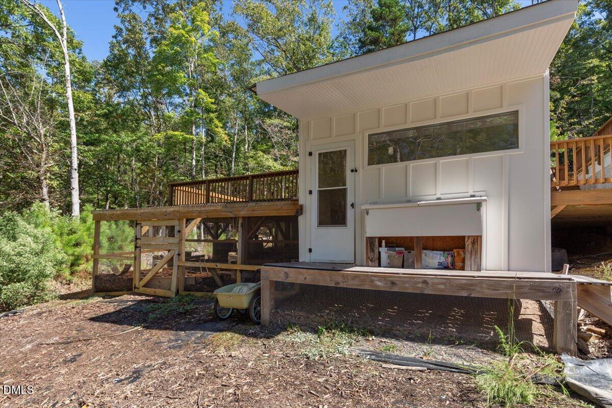 343 Deer Mountain Road Pittsboro, NC 27312 - Photo 52 of 55 a front view of a house with a yard