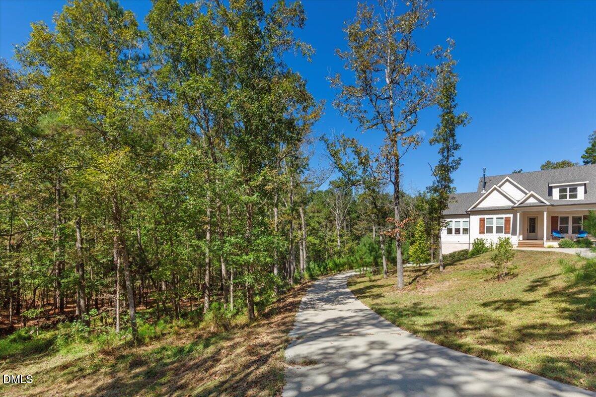 343 Deer Mountain Road Pittsboro, NC 27312 - Photo 54 of 55 a view of residential houses with yard and mountain view in back