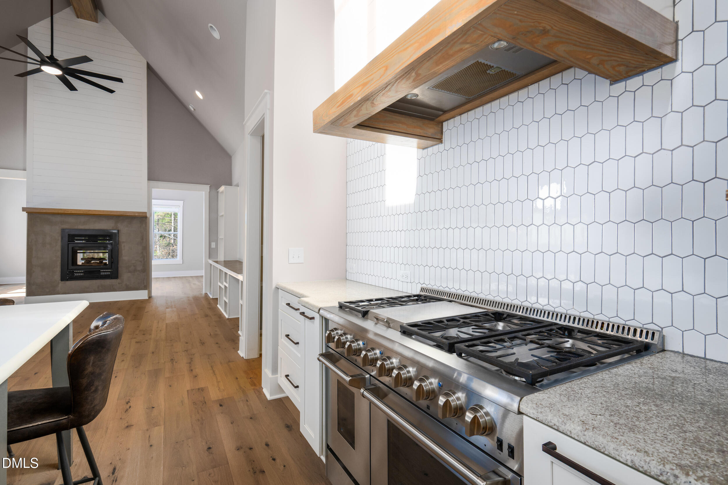 343 Deer Mountain Road Pittsboro, NC 27312 - Photo 9 of 55 a stove top oven sitting inside of a kitchen