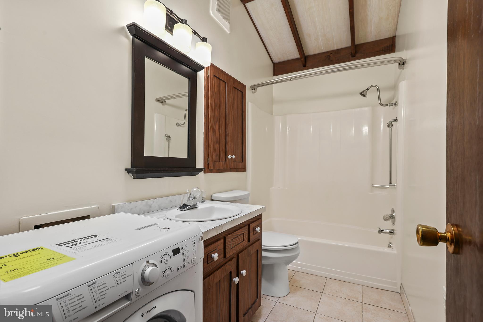 758 Club House Road Front Royal, VA 22630 - Photo 23 of 50 a bathroom with a sink a vanity and a mirror