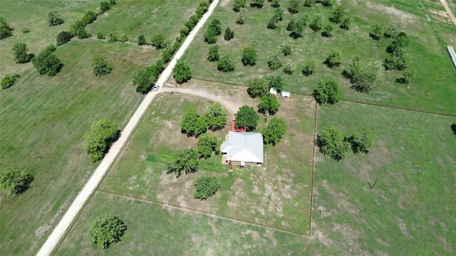 a view of a garden with a fountain
