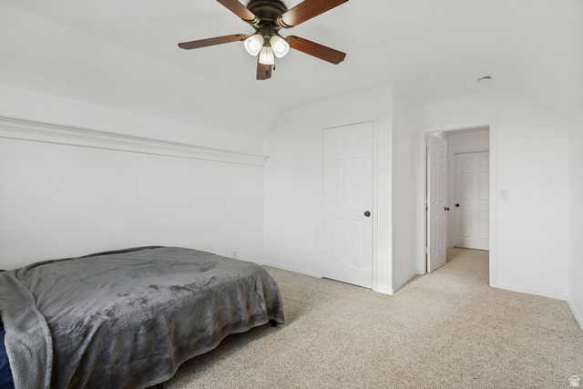 1585 South 910 West Payson, UT 84651 - Photo 18 of 32 Carpeted room with a ceiling fan, white paneled doors, and crown molding detail