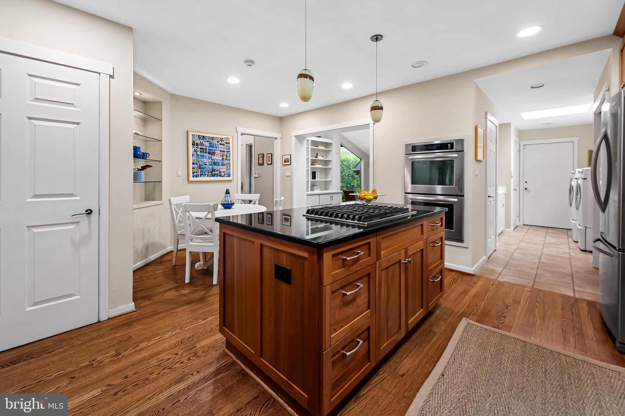 2423 Still Forest Road Pikesville, MD 21208 - Photo 21 of 62 Kitchen w/gas cooktop and pendant lights
