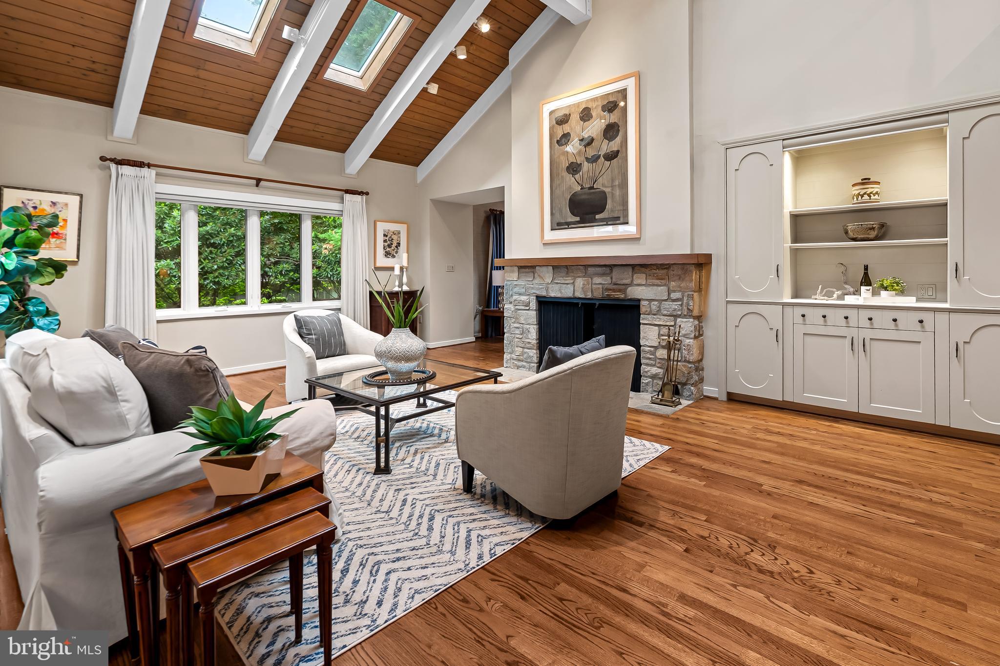 2423 Still Forest Road Pikesville, MD 21208 - Photo 6 of 62 Living room w/beautiful hardwood floors, skylights