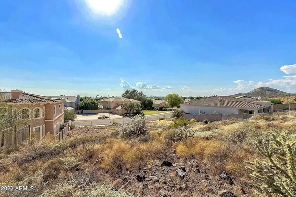 an aerial view of a house with a outdoor space