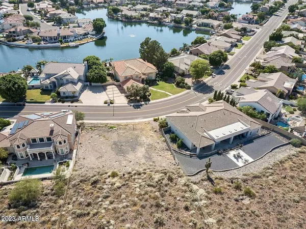 a aerial view of a house with a yard