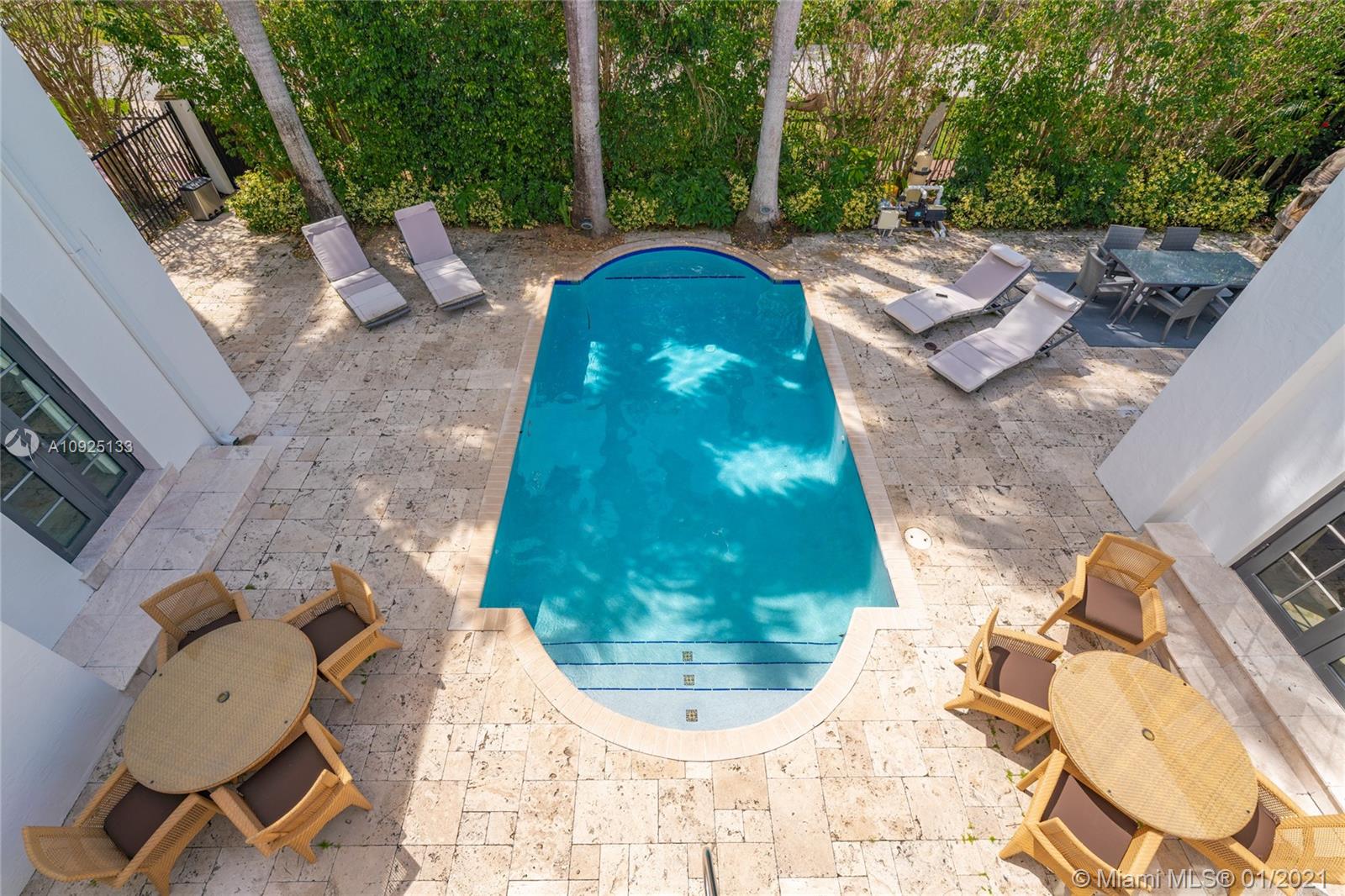 5300 Pine Tree Drive Miami Beach, FL 33140 - Photo 30 of 40 an outdoor view with patio