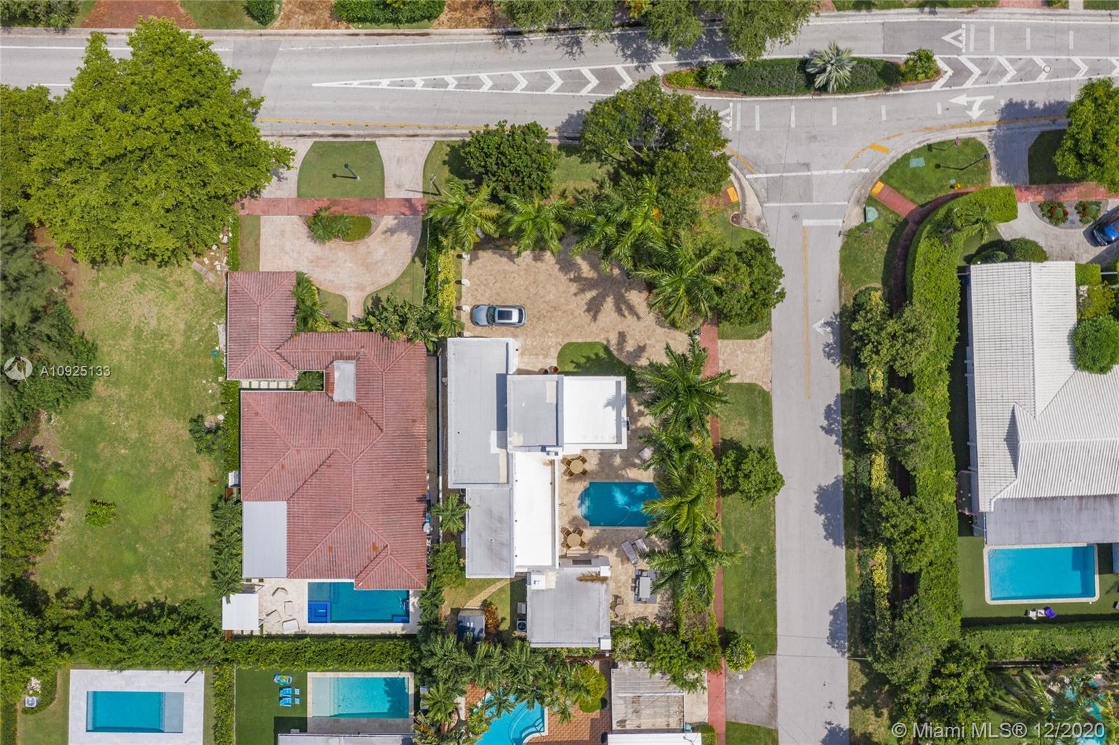 5300 Pine Tree Drive Miami Beach, FL 33140 - Photo 39 of 40 an aerial view of residential houses with outdoor space and street view