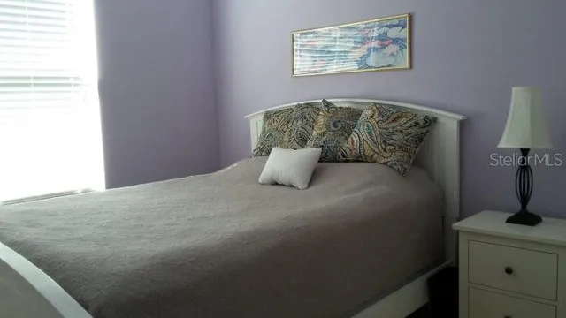 a view of a two chairs in the balcony