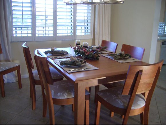 415 Augusta Boulevard, Unit 310 Naples, FL 34113 - Photo 3 of 15 a view of a dining room with furniture and window