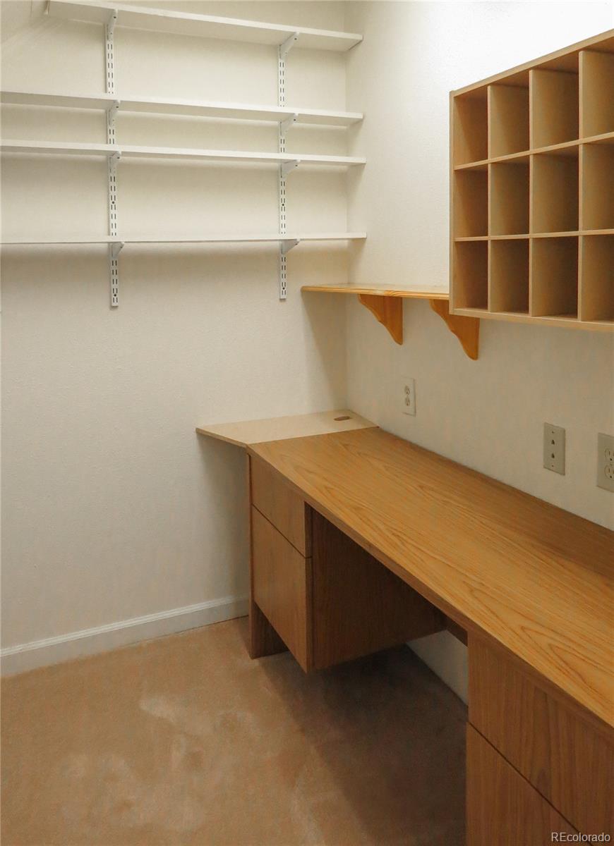 2141 Legacy Ridge View, Unit 101 Colorado Springs, CO 80910 - Photo 13 of 14 a view of an empty walk in closet