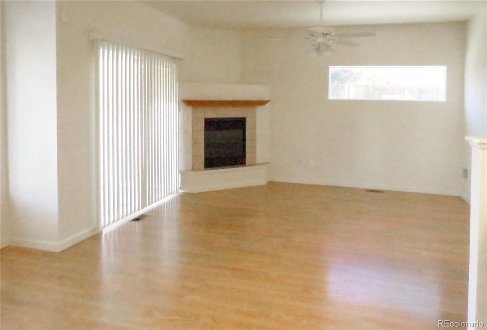 2141 Legacy Ridge View, Unit 101 Colorado Springs, CO 80910 - Photo 2 of 14 a view of an empty room with a window