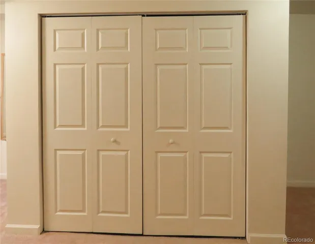 a view of a small space with a fan