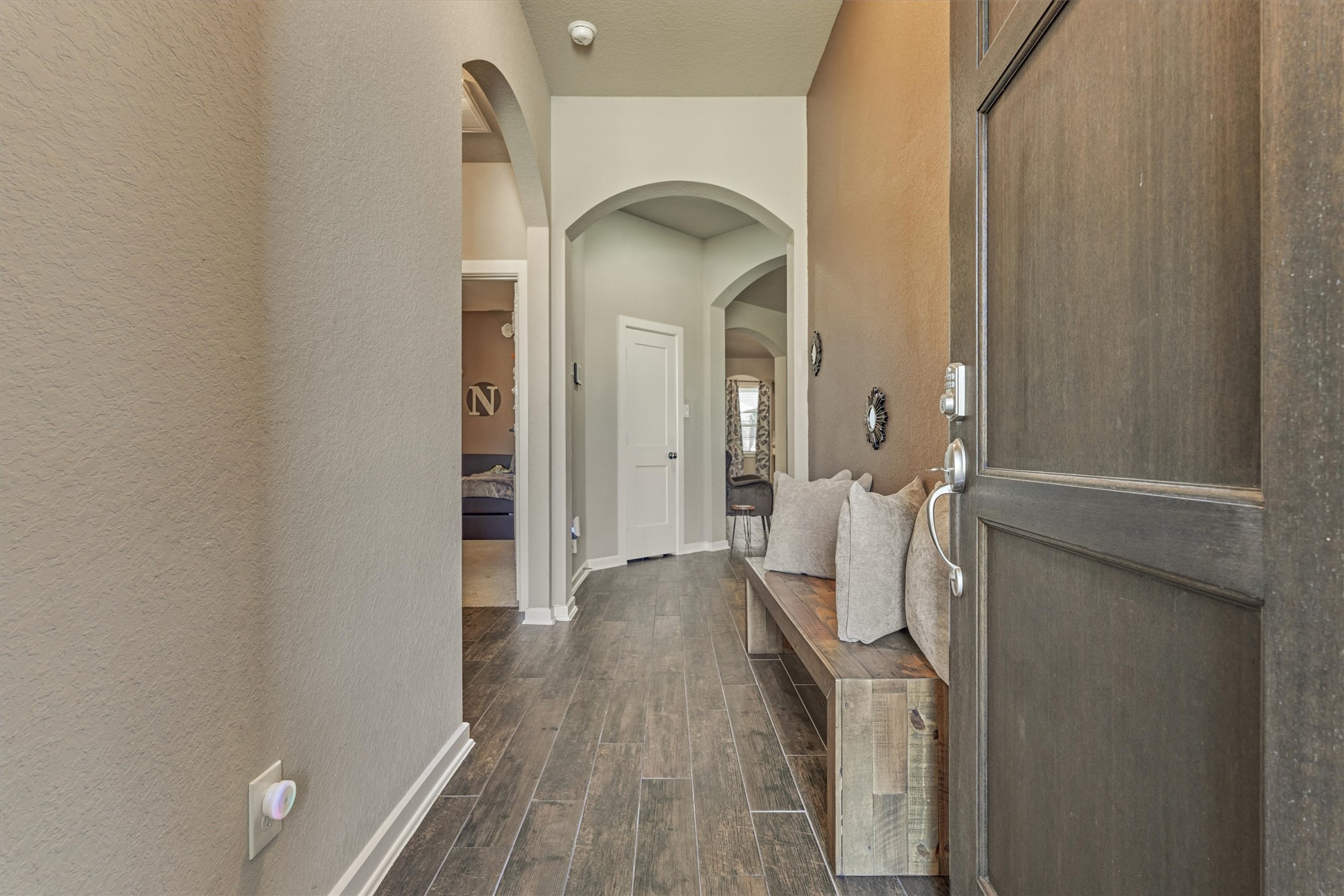 17015 Ash Leaf Way Conroe, TX 77385 - Photo 3 of 25 a view of entryway with wooden floor