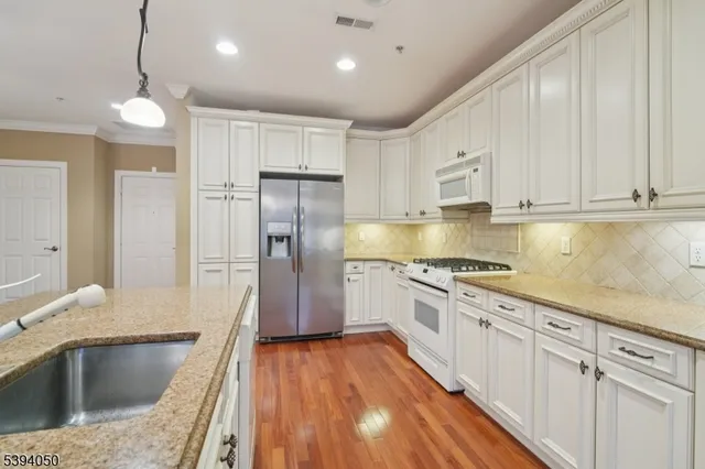 $435,000 | 5101 Pointe Gate Drive, Unit 101, Livingston, NJ 07039