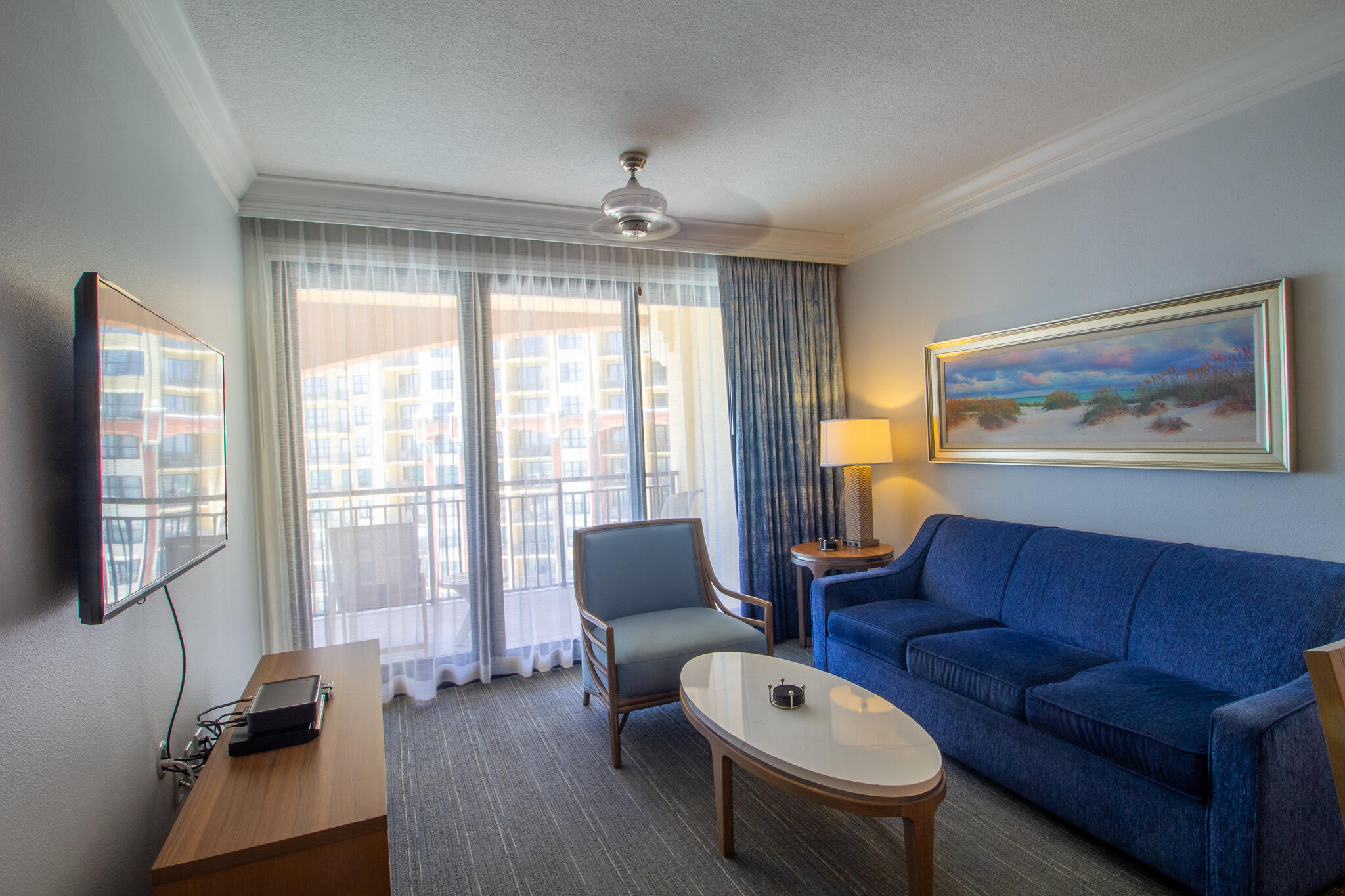 10 Harbor Boulevard, Unit E704A Destin, FL 32541 - Photo 3 of 29 a living room with furniture and a large window