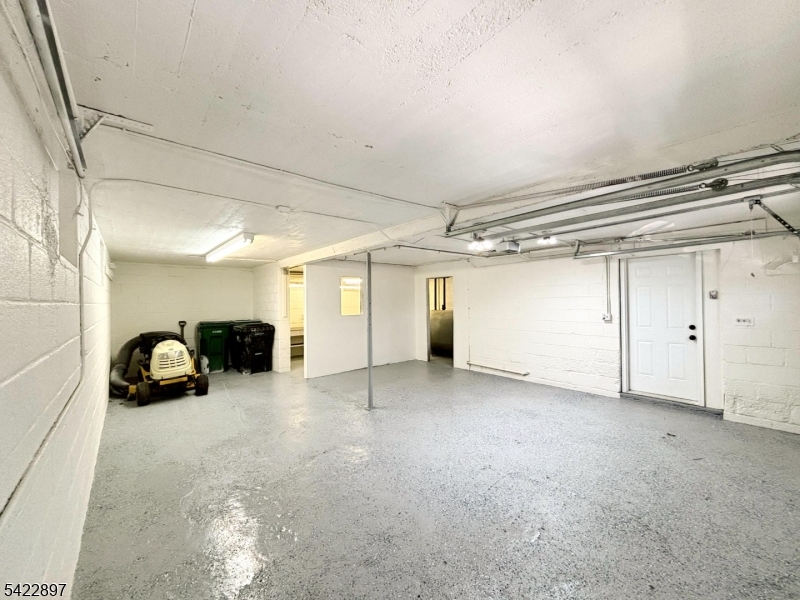 4 Baker Road Vernon, NJ 07461 - Photo 20 of 30 a view of a livingroom with a car parked in it