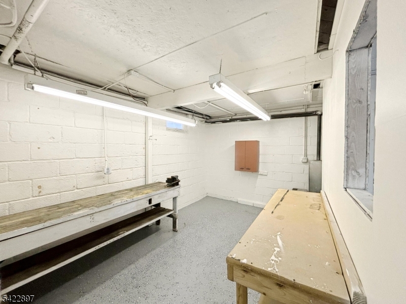 4 Baker Road Vernon, NJ 07461 - Photo 22 of 30 a spacious bathroom with a granite countertop sink and a bathtub