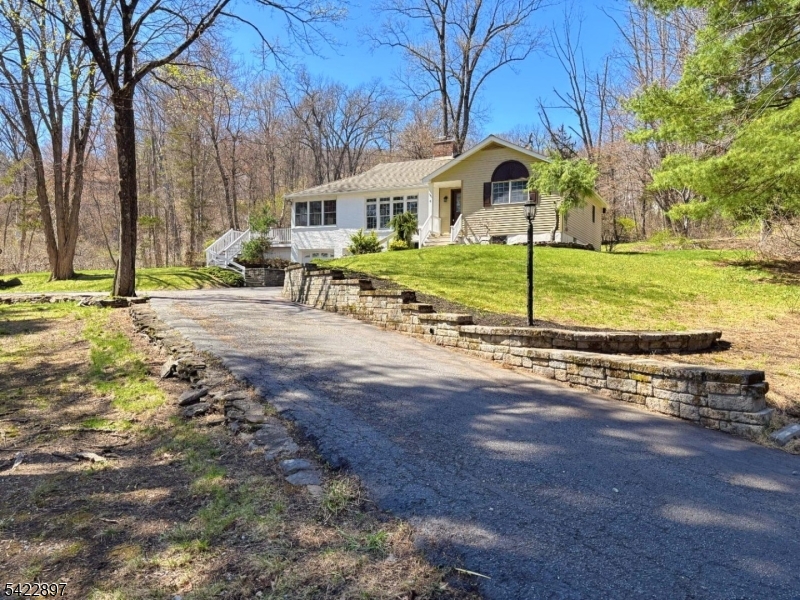 4 Baker Road Vernon, NJ 07461 - Photo 30 of 30 a view of a house with backyard and trees