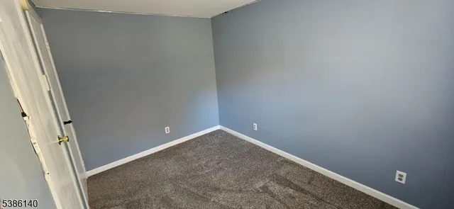 a view of a room with lots of gym equipment