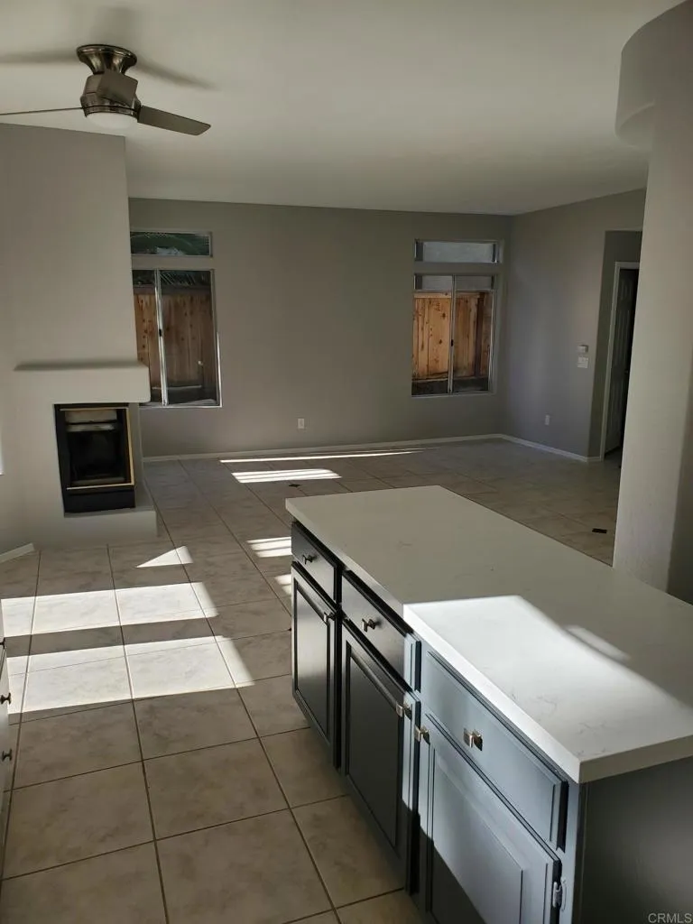 3619 Via Bernardo Oceanside, CA 92056 - Photo 2 of 8 a kitchen with a sink appliances and cabinets
