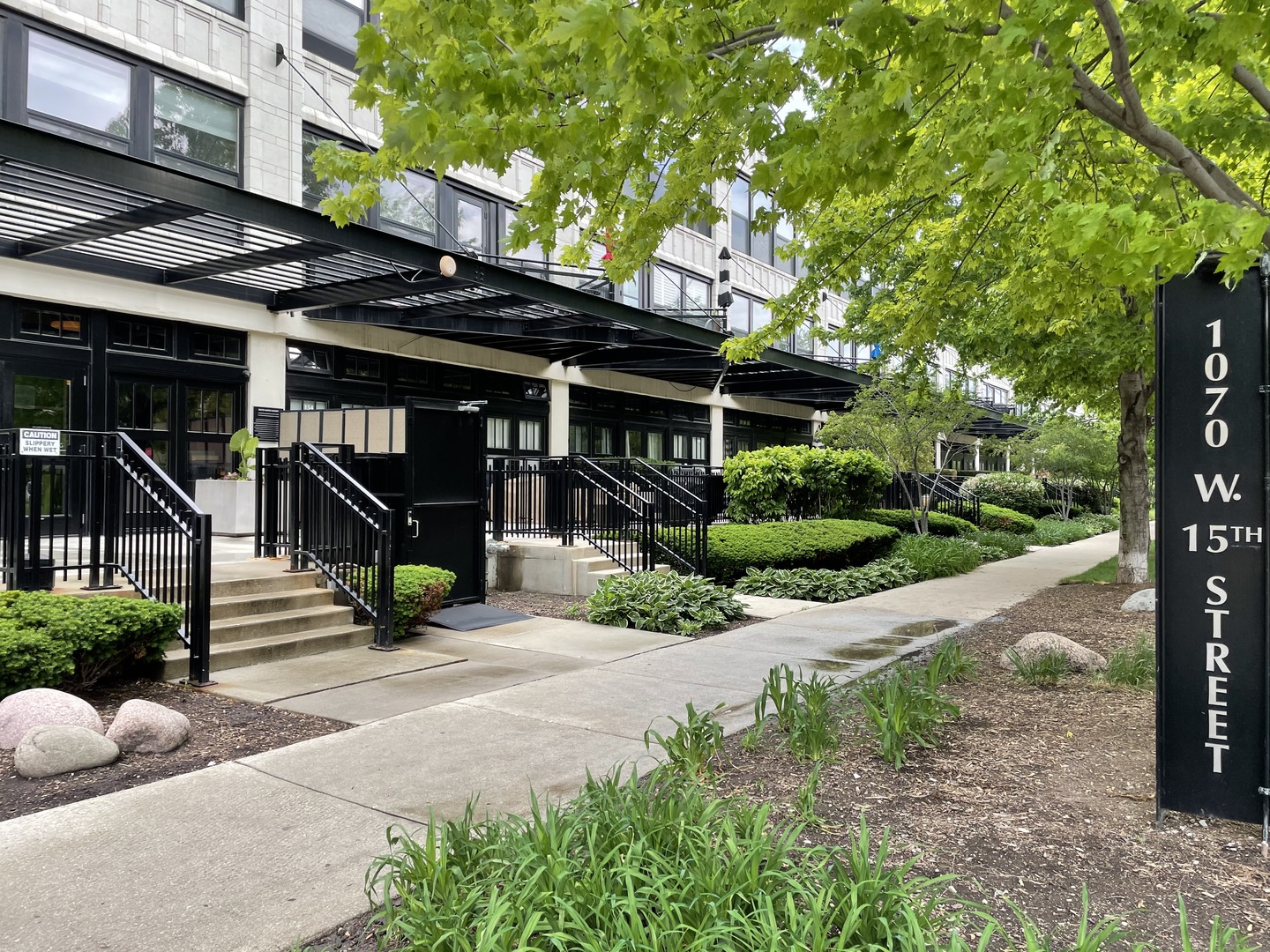 1070 West 15th Street, Unit 102 Chicago, IL 60608 - Photo 1 of 20 a view of street with sitting area
