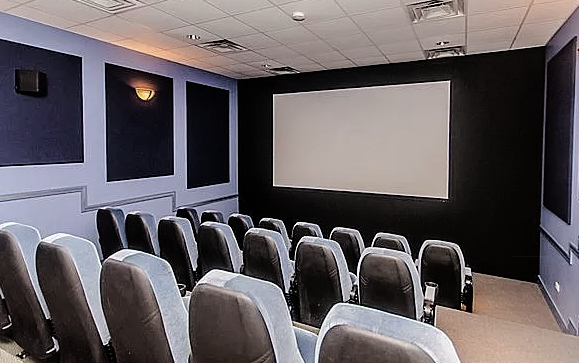 1070 West 15th Street, Unit 102 Chicago, IL 60608 - Photo 20 of 20 a projector room with furniture
