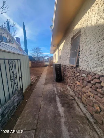a view of a backyard of a house