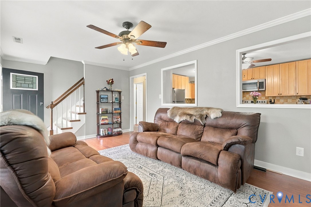 194 Poplar Road Aylett, VA 23009 - Photo 8 of 48 Living area featuring wood-finish flooring, a ceil