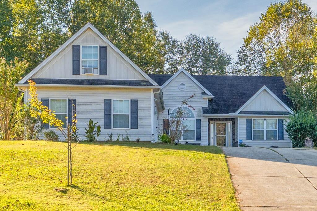 a view of a house with swimming pool