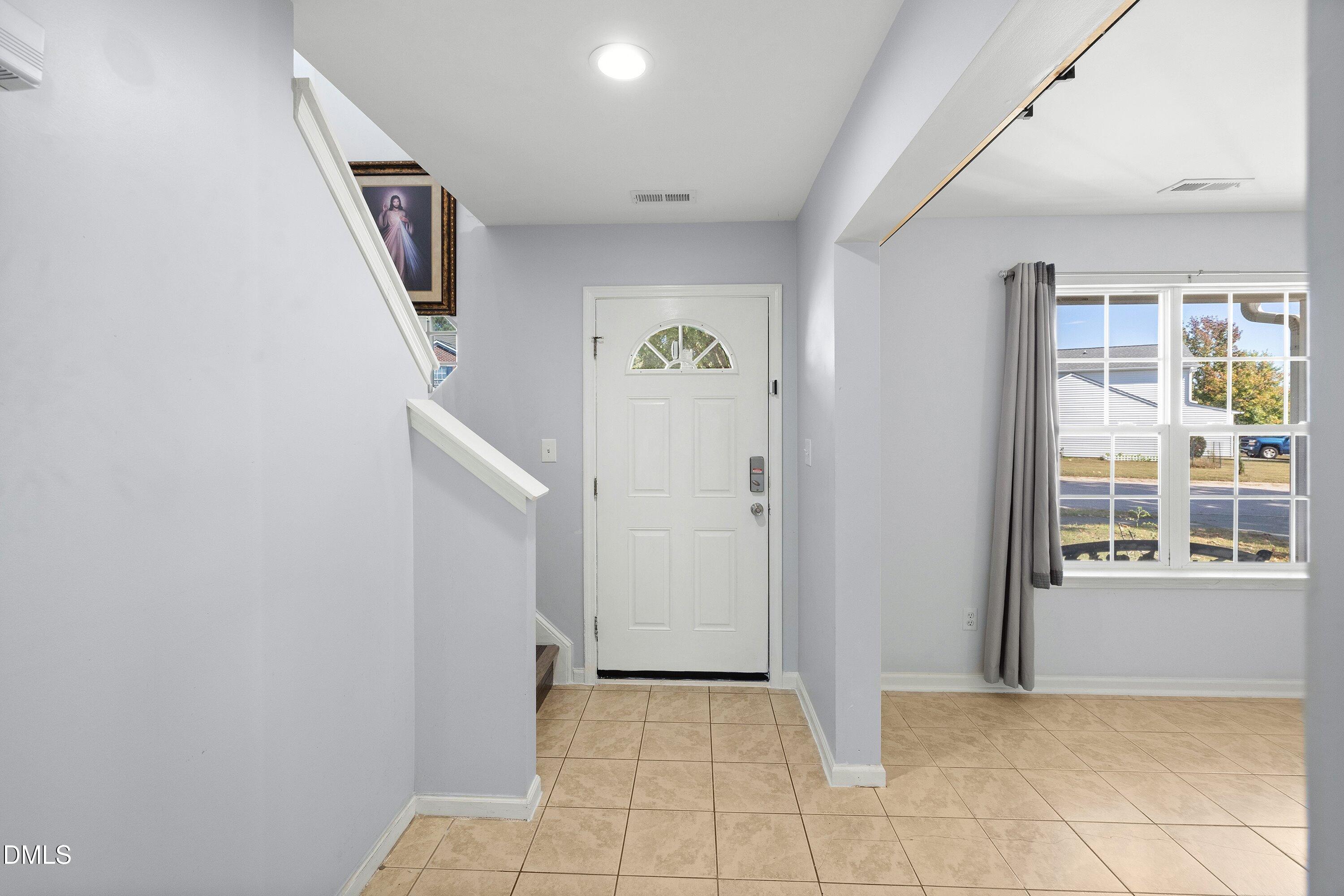 4018 Rothfield Lane Raleigh, NC 27616 - Photo 9 of 44 Foyer