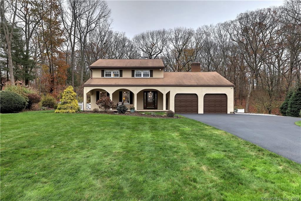 178 West Rutland Road Milford, CT 06461 - Photo 1 of 1 a front view of a house with garden