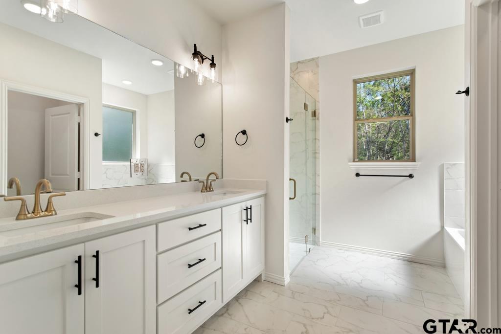 496 Preston Rdg Drive Tyler, TX 75703 - Photo 24 of 34 a bathroom with a granite countertop sink mirror and double
