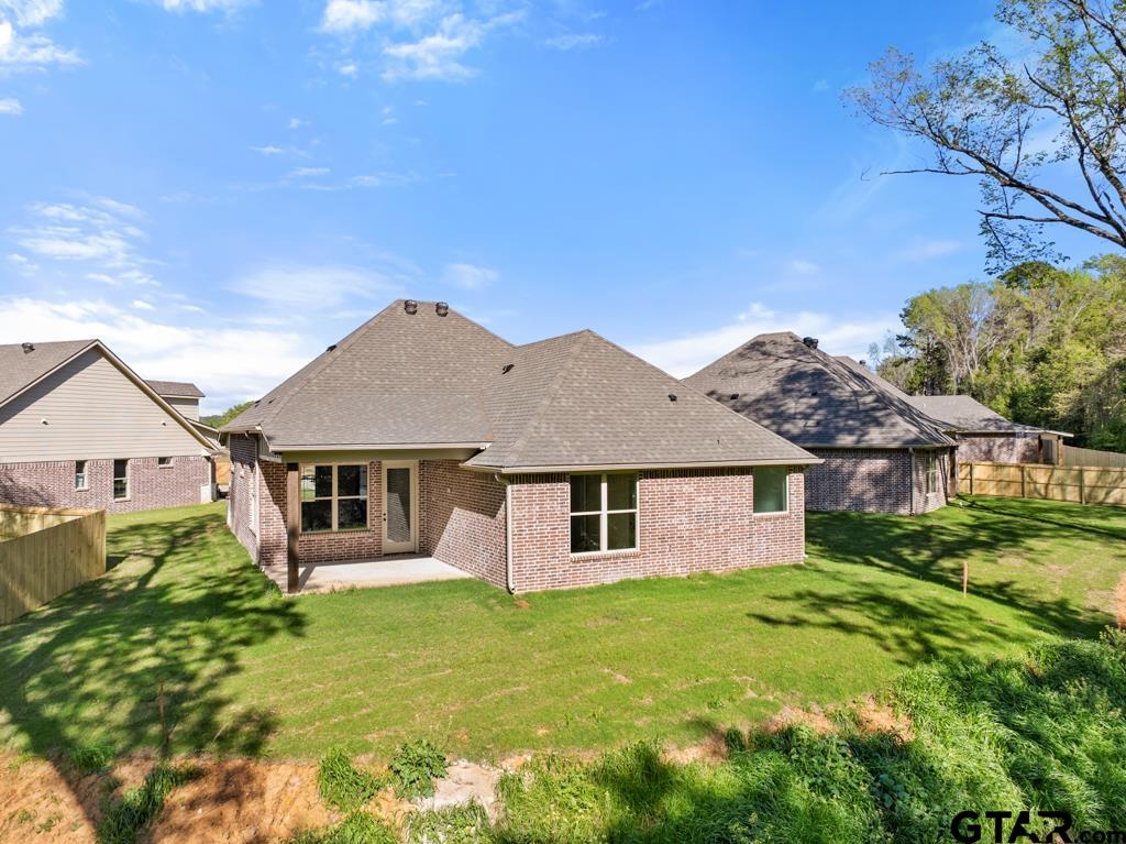 496 Preston Rdg Drive Tyler, TX 75703 - Photo 31 of 34 front view of a house with a yard