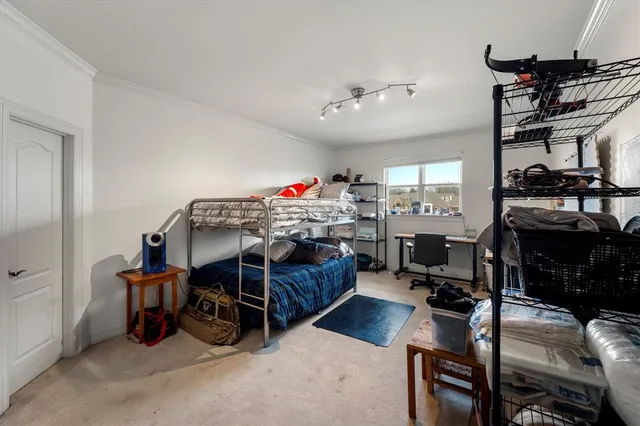 a bedroom with furniture