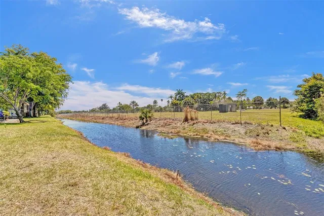 a view of a lake with a beach