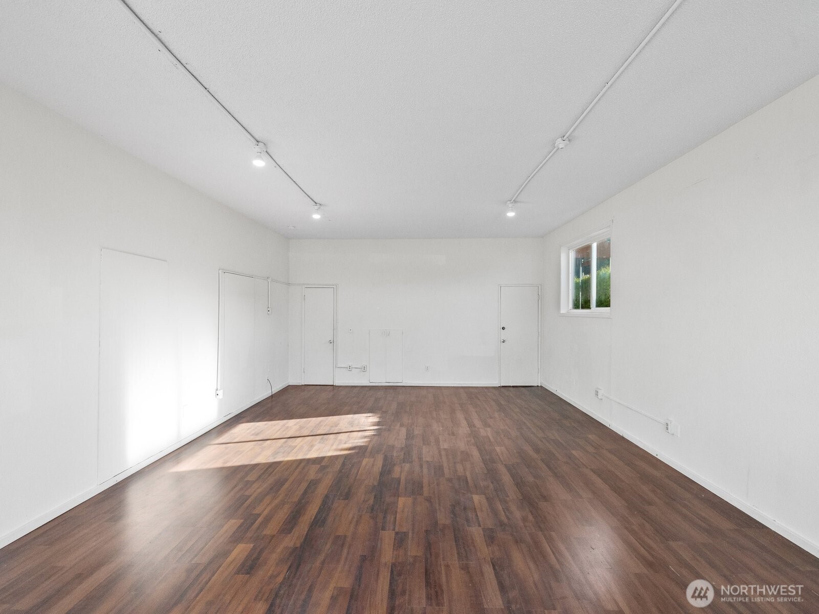 6325 Evergreen Way Everett, WA 98203 - Photo 11 of 38 an empty room with wooden floor