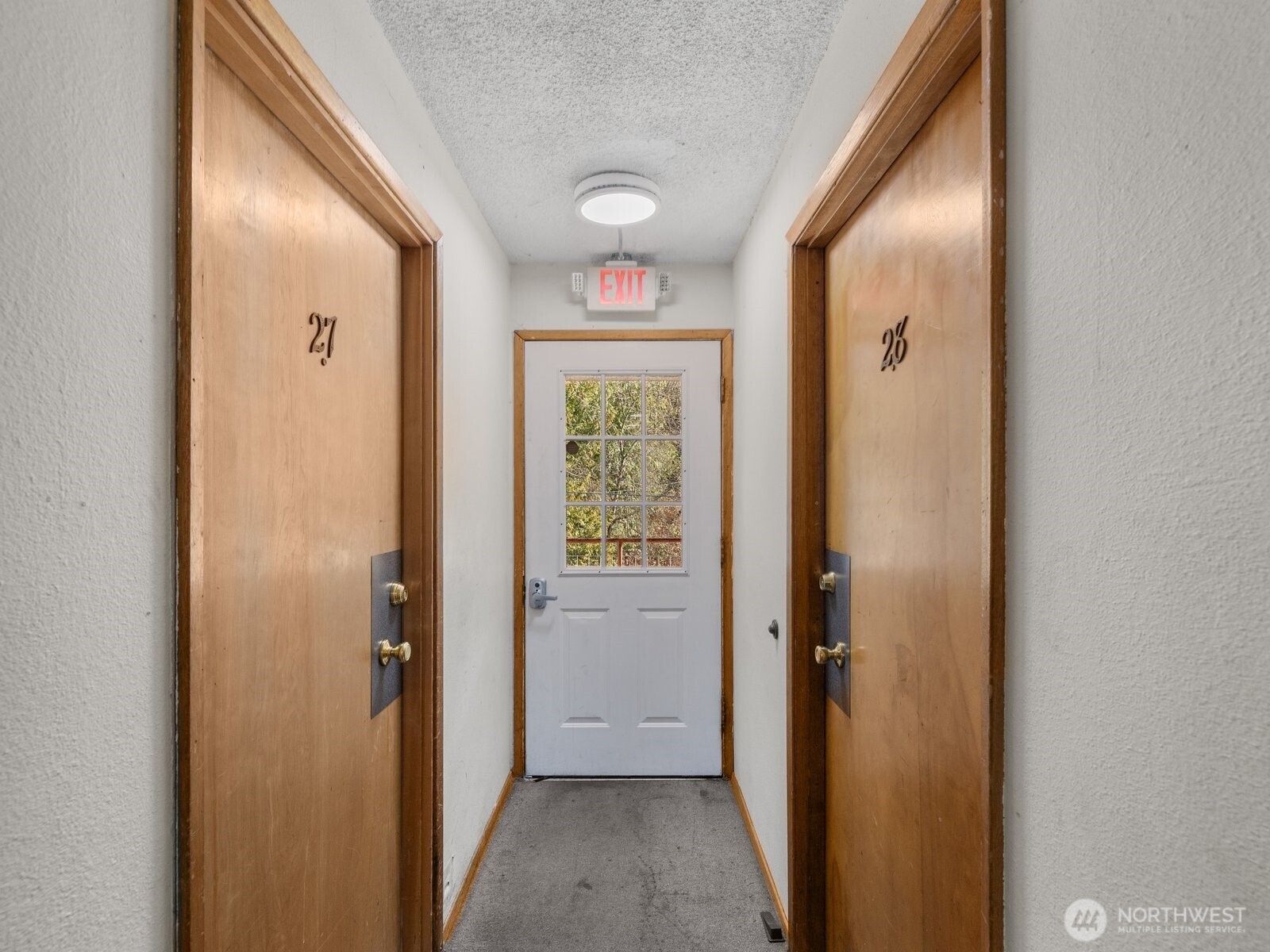 6325 Evergreen Way Everett, WA 98203 - Photo 16 of 38 a view of a hallway with wooden floor and closet