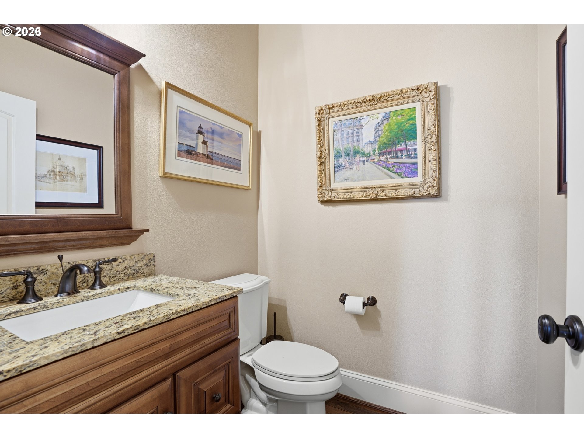 2552 Northwest 12th Circle Camas, WA 98607 - Photo 11 of 46 a bathroom with a granite countertop toilet a sink and mirror