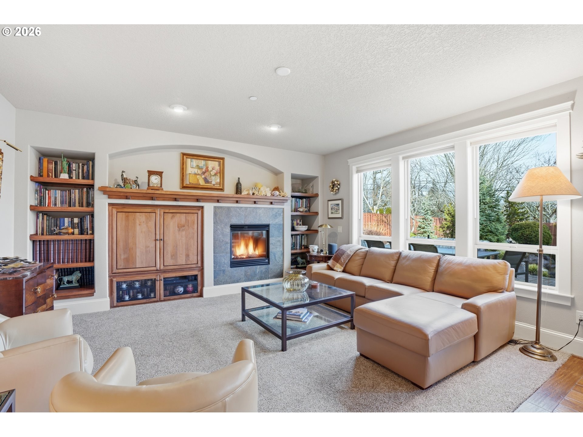 2552 Northwest 12th Circle Camas, WA 98607 - Photo 19 of 46 a living room with furniture and a fireplace