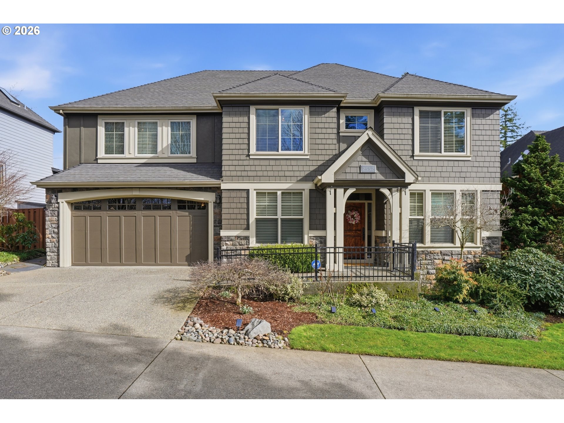 2552 Northwest 12th Circle Camas, WA 98607 - Photo 2 of 46 a front view of a house with a yard