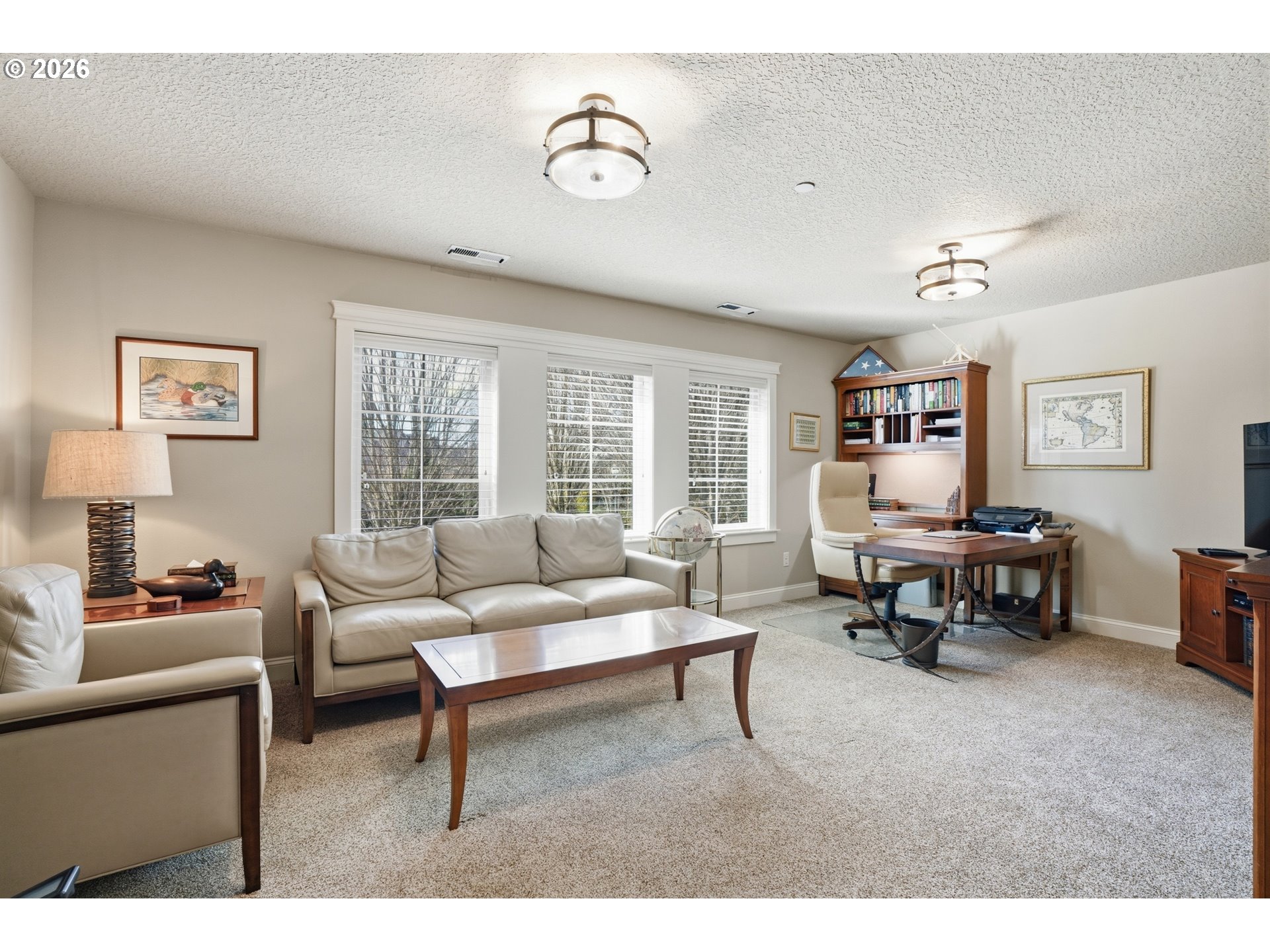2552 Northwest 12th Circle Camas, WA 98607 - Photo 21 of 46 a living room with furniture and a window