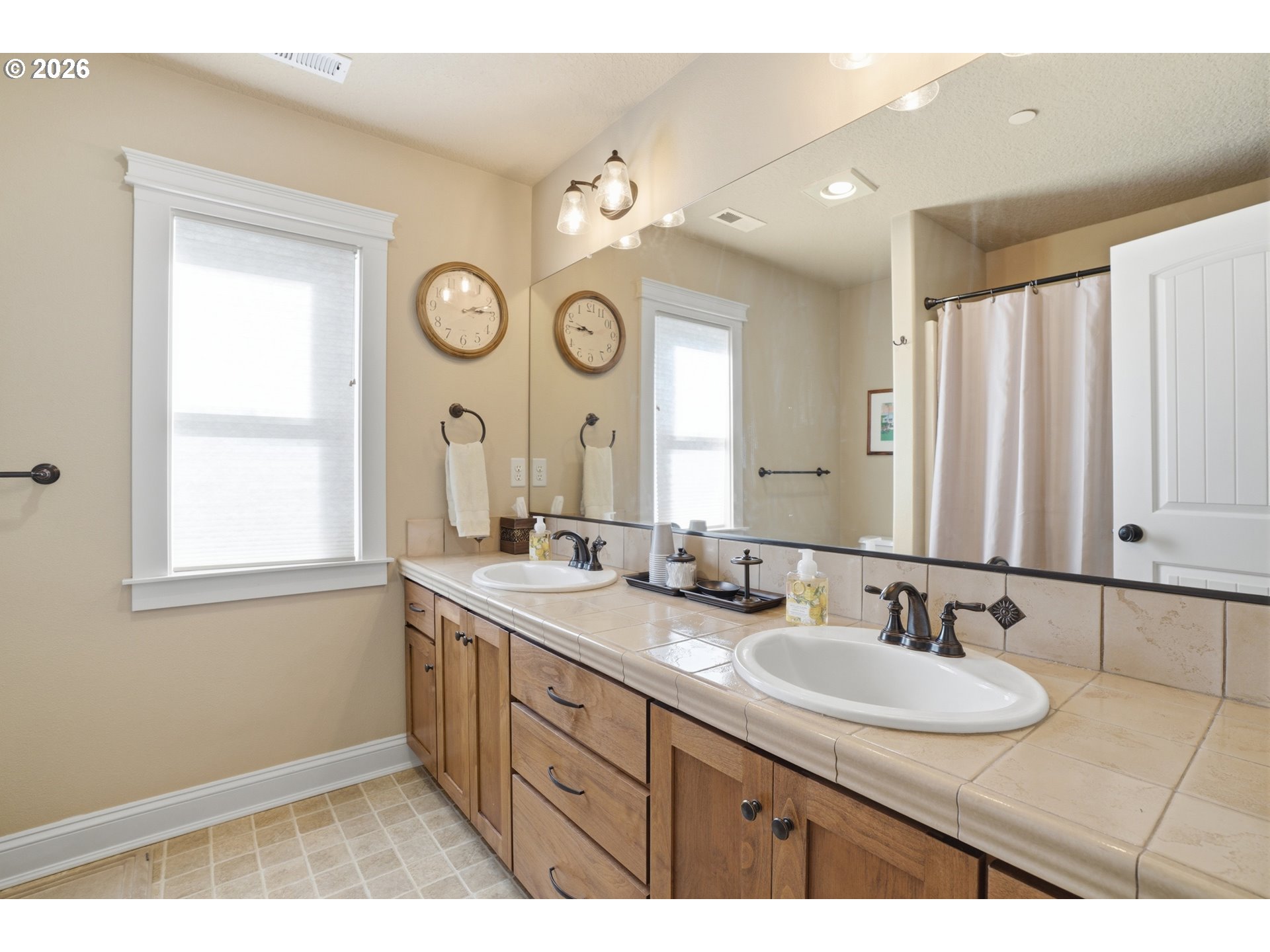 2552 Northwest 12th Circle Camas, WA 98607 - Photo 27 of 46 a bathroom with a sink and a mirror