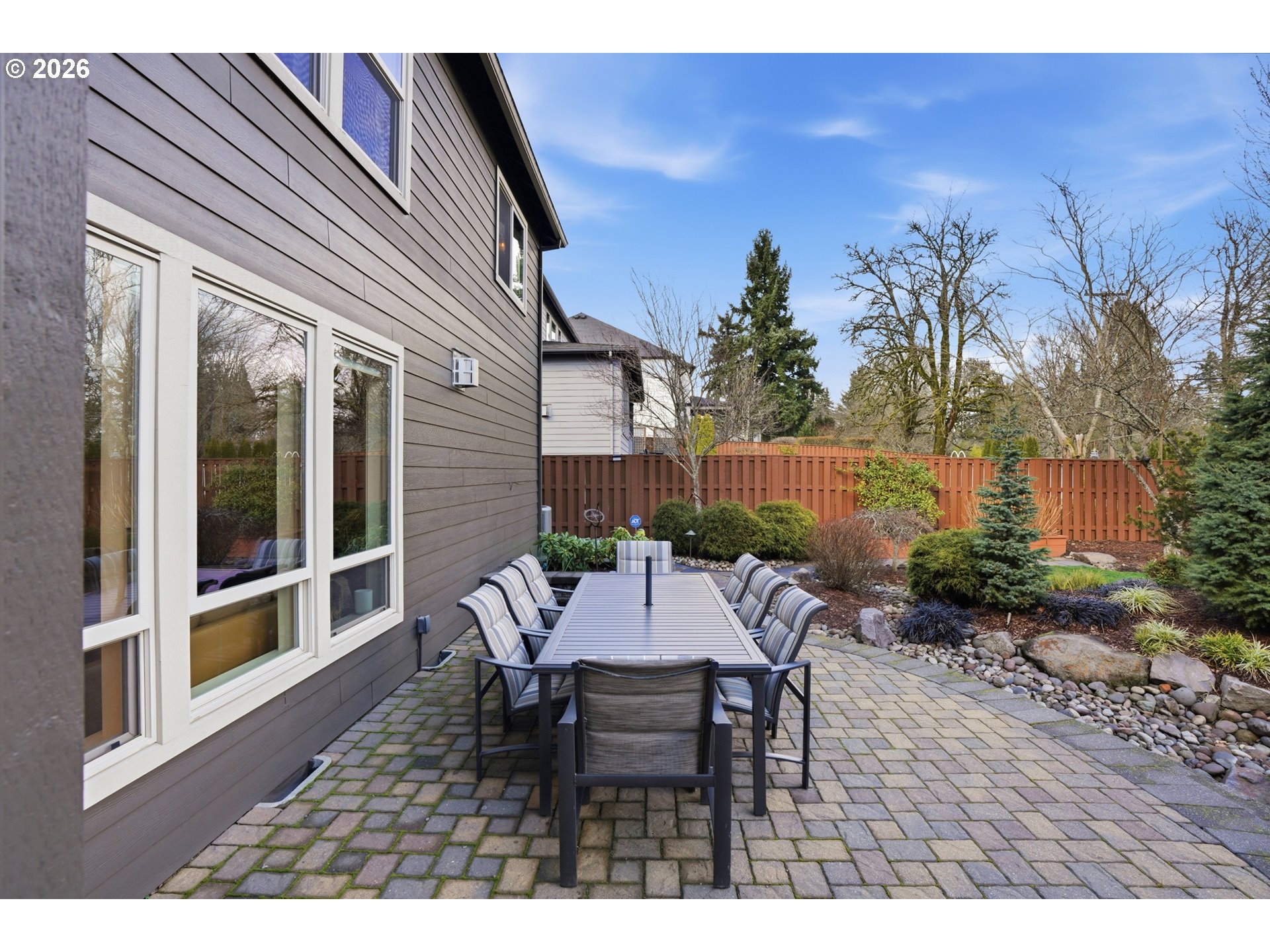 2552 Northwest 12th Circle Camas, WA 98607 - Photo 33 of 46 a view of a patio with a table and chairs and potted plants