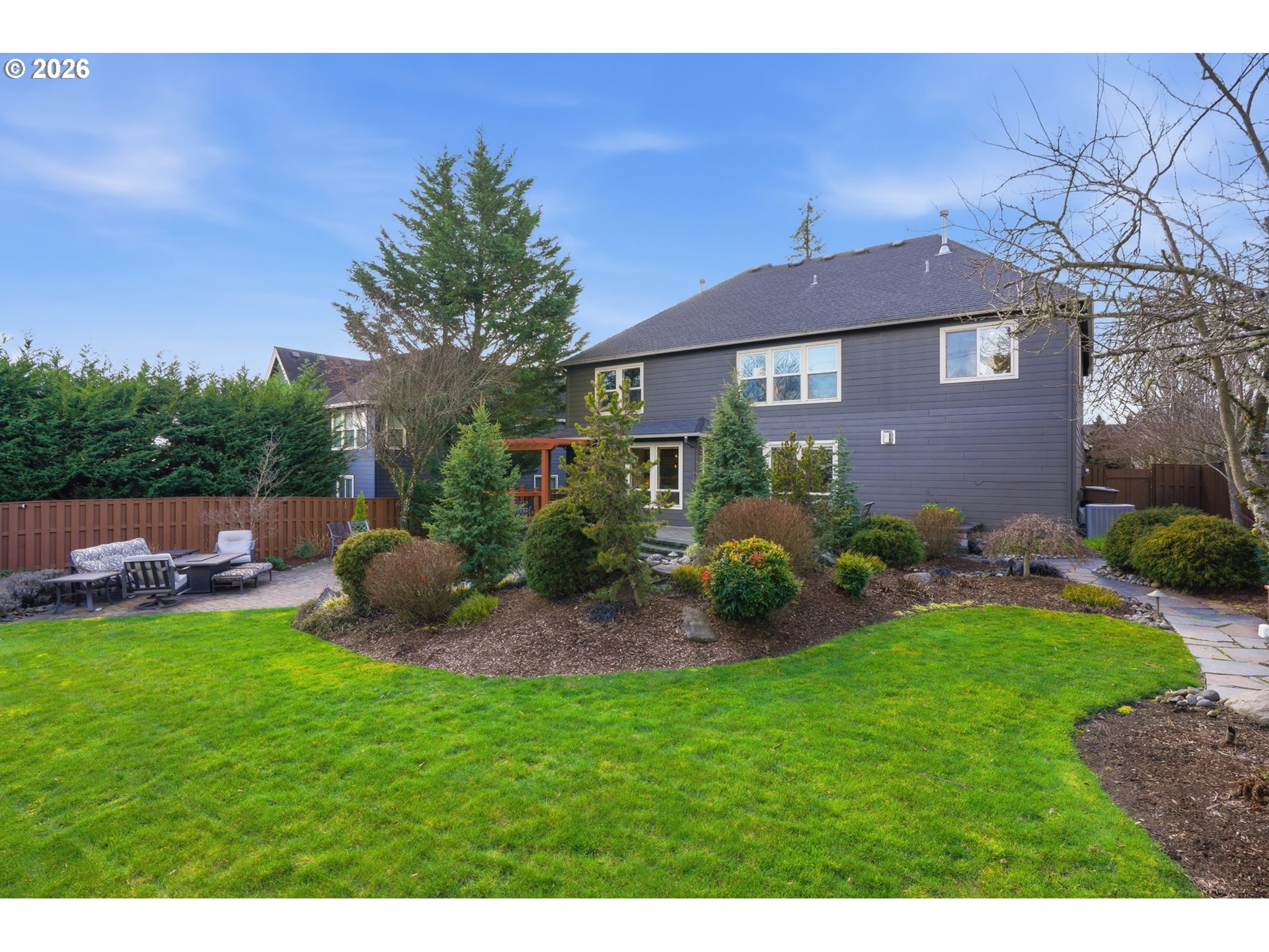 2552 Northwest 12th Circle Camas, WA 98607 - Photo 40 of 46 a view of a house with a backyard