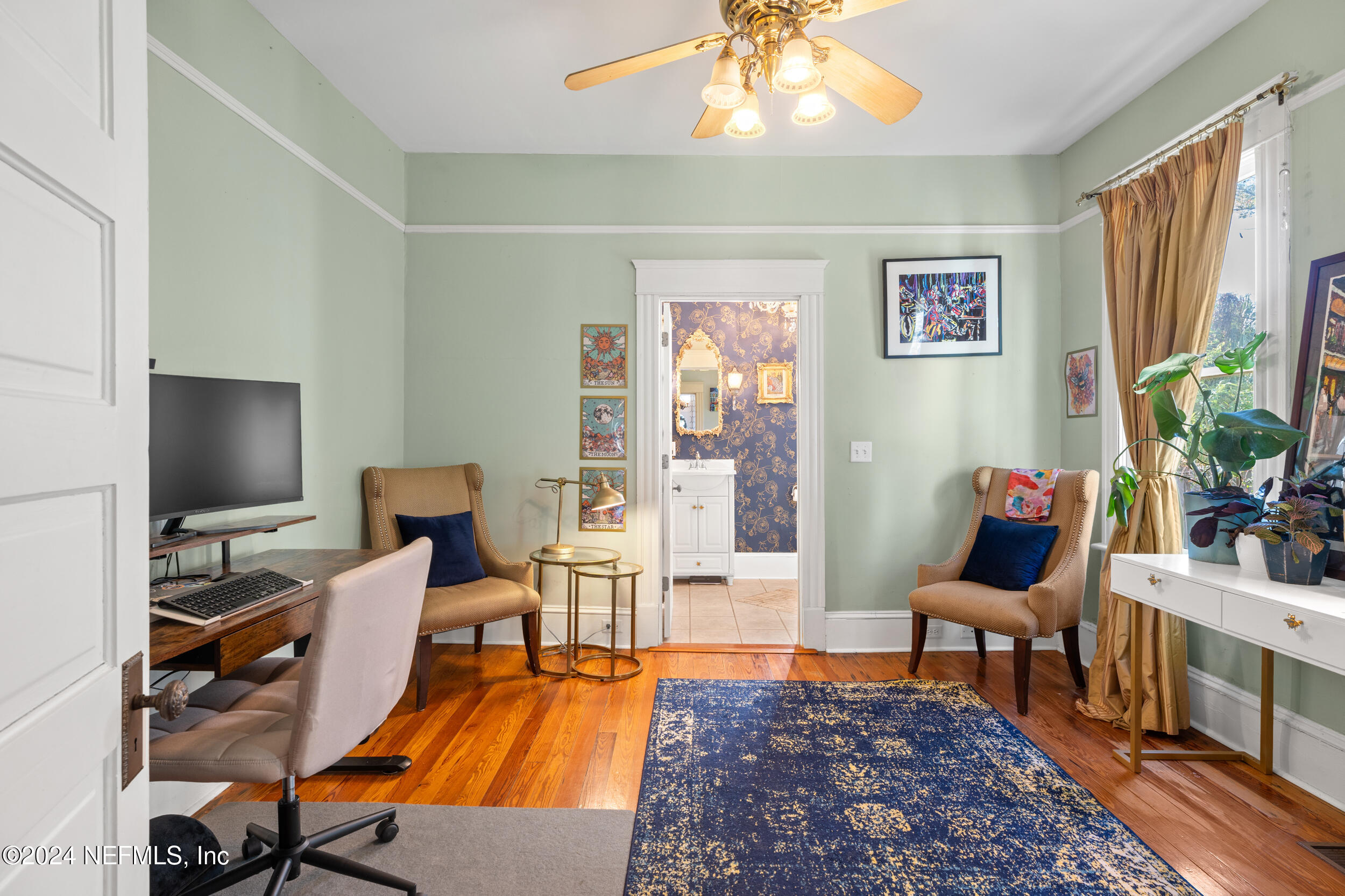 2230 Post Street Jacksonville, FL 32204 - Photo 23 of 48 a living room with furniture and a flat screen tv