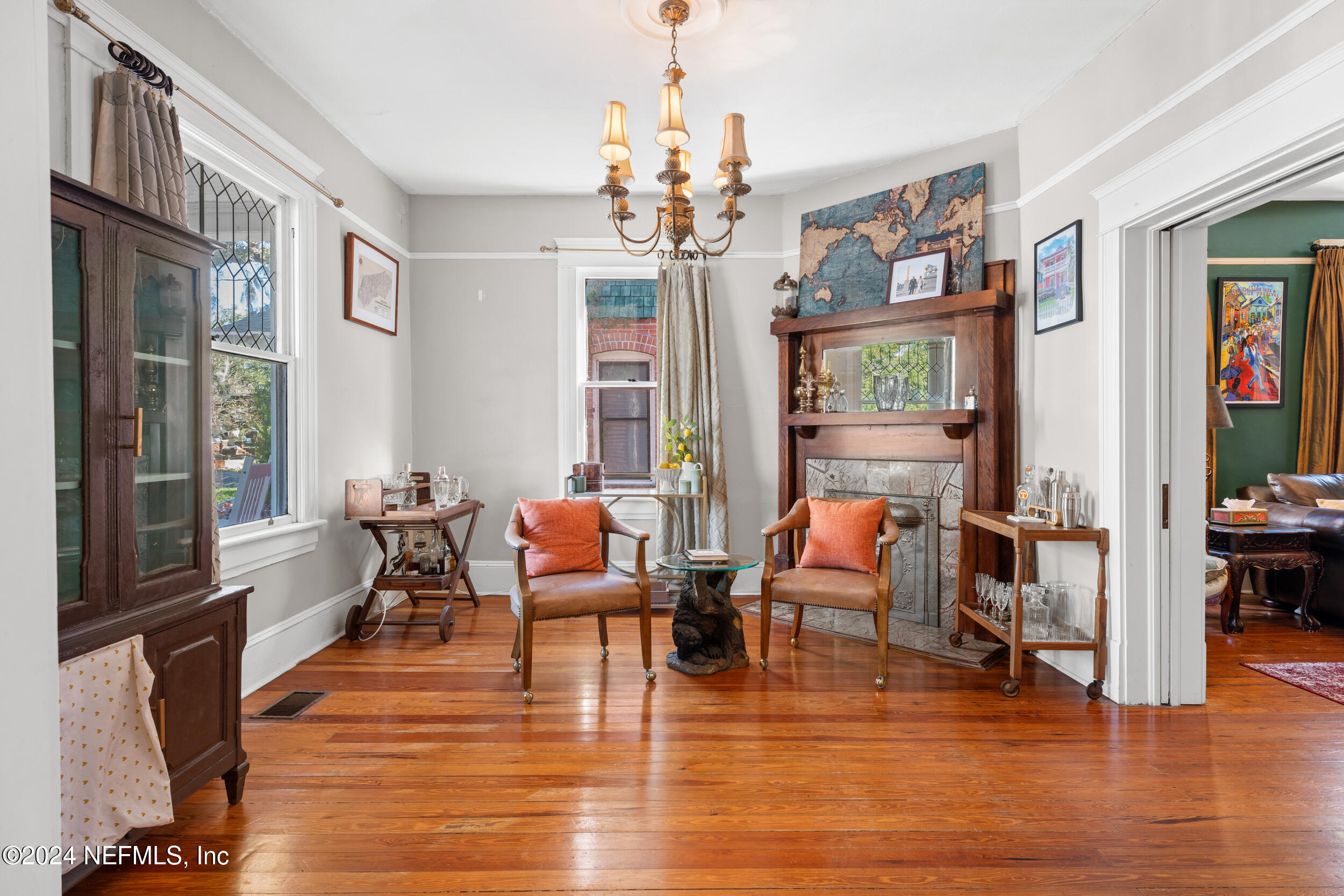 2230 Post Street Jacksonville, FL 32204 - Photo 8 of 48 a living room with fireplace furniture and a chandelier