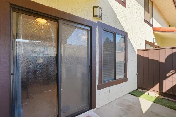 a view of a house with a large window