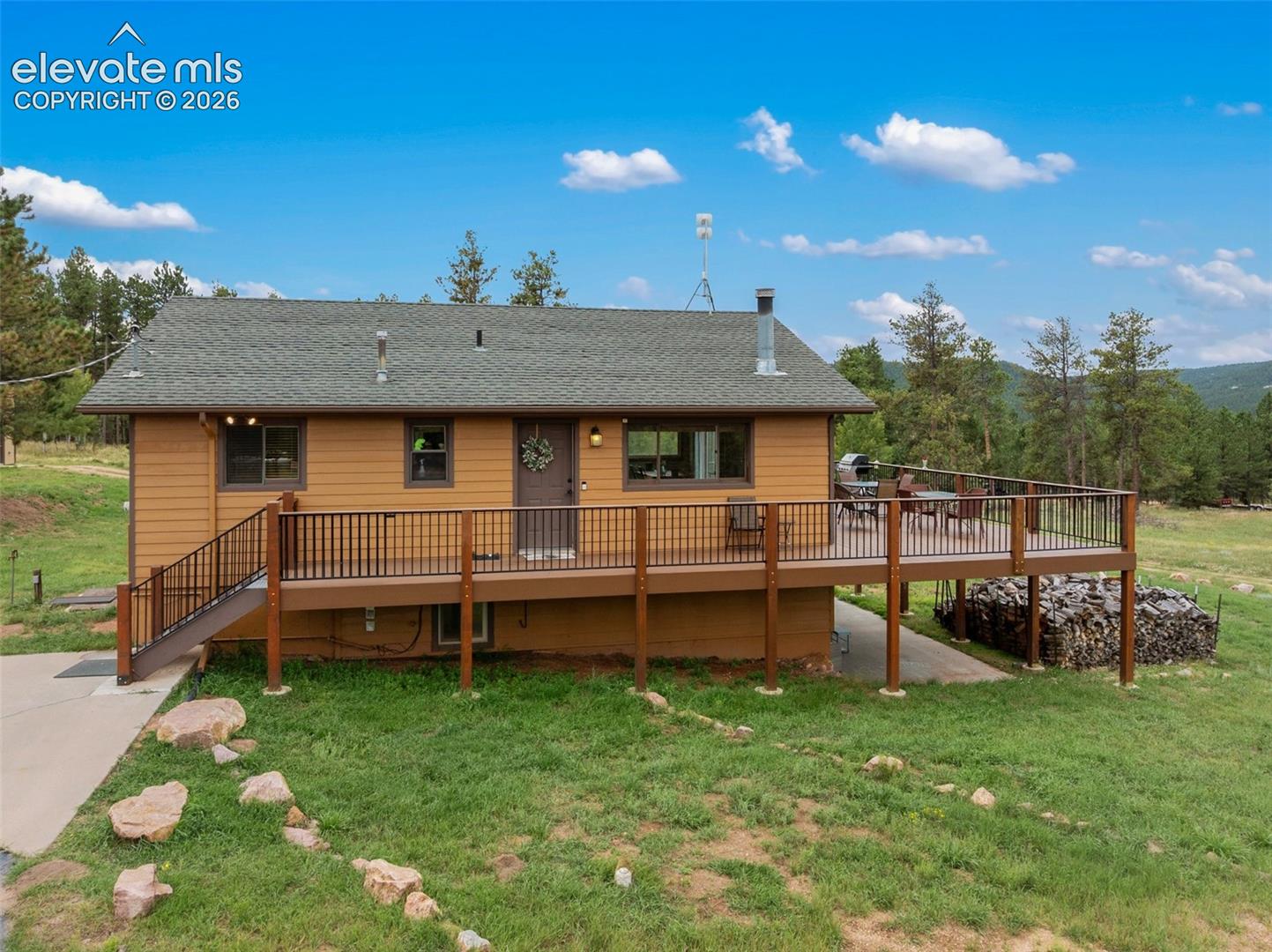 100 Mills Ranch Road Woodland Park, CO 80863 - Photo 9 of 49 Upgraded composite deck with metal supports!